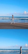 李斯羽针织小背心搭配牛仔长裤，大秀纤细线条海边写真美照