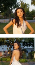 匀称身形女生何瑞贤享受户外时光，V领露背装白裙，气质美丽
