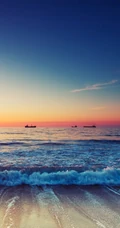 落日火烧云和大海太配了，海上的火烧云风景手机壁纸
