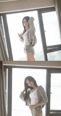 白皙线条感长发女生休闲装背心短裤居家慵懒写真图片