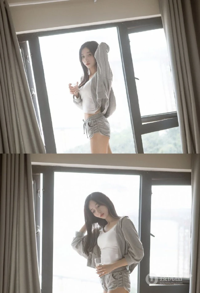 白皙线条感长发女生休闲装背心短裤居家慵懒写真图片