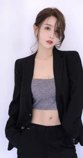 高颜值小脸女生轻熟黑色西装礼裙衣搭配大秀匀称线条纤细纤细线条高清图片