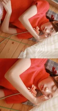 穿红色针织衫毛衣短裤的大眼睛单麻花辫美丽女孩艺术室内摄影图片