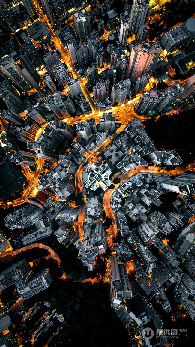 高清航拍夜间的繁华城市流动的车灯风景