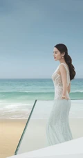 迪丽热巴人鱼公主装白裙超美海边写真照