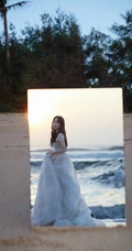 邓恩熙气质时尚白裙着身宛若公主海边唯美写真图片
