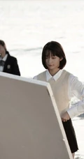 段奥娟学生装格子短裤唯美海边写真图片