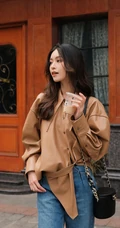 文咏珊气质动人长发微卷手拿奶茶咖啡街拍写真美照