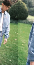 陈星旭手拿相机户外采风文艺范写真，身着牛仔服套装帅气十足