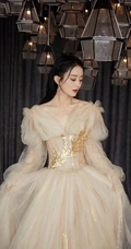 赵丽颖鹅黄色轻纱长裙穿着显动人锁骨气质优雅写真图片