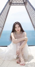 柳岩印花白裙海边气质写真图片