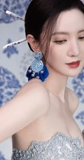 张萌气质V领礼裙青花瓷亮闪长裙古装扮相写真照片