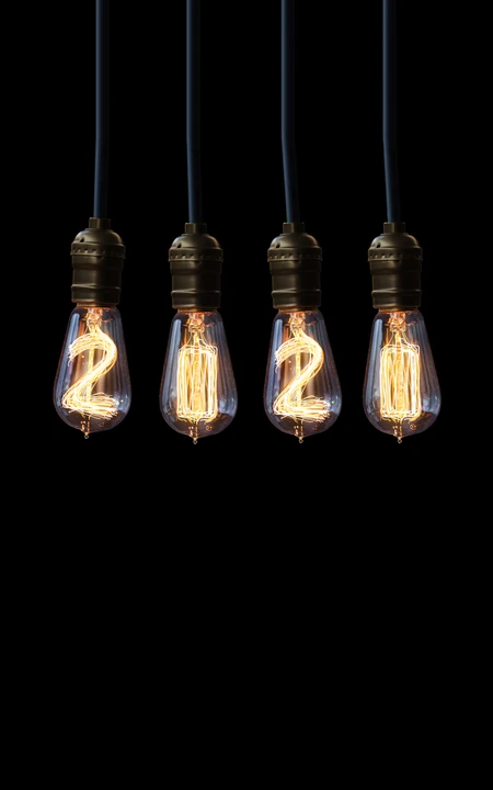 黑色背景 由老式拉线灯泡组成的2021数字创意手机壁纸图片