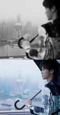 鹿晗水墨风休闲西服黑裤，手拿雨伞宛若翩翩公子户外帅气写真照片