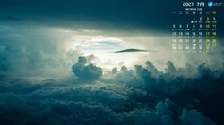 2021年7月日历壁纸，天空，云朵，飞机，北极光等为背景的日历壁纸图片