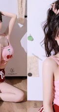 笑容超甜的双马尾气质浅粉少女身着可爱樱桃背心短裤居家吃樱桃写真图集