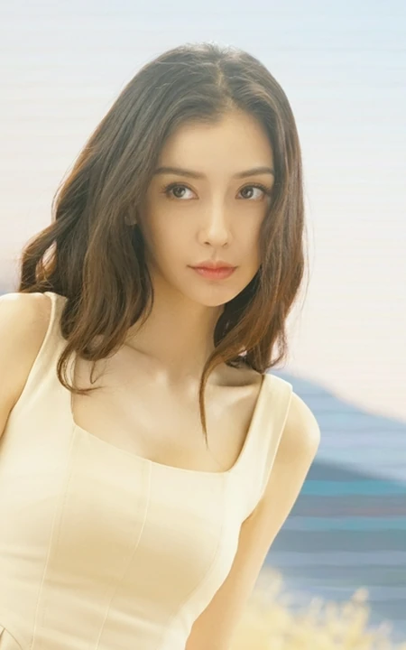 Angelababy身着麦色连衣裙在麦田中清新清新写真花絮美照