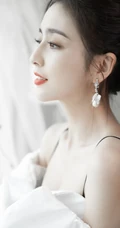 佟丽娅简约时尚纯白蝴蝶结连衣裙穿搭仙气十足写真美照