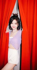 吴宣仪紫色针织开衫搭配白色短裤甜美率真写真图片