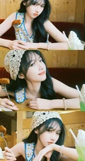 女生宋昕冉戴着可爱围帽加背心长裙边吃美食边拍照可爱甜美写真图集