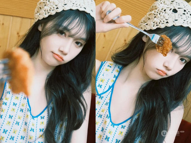 女生宋昕冉戴着可爱围帽加背心长裙边吃美食边拍照可爱甜美写真图集