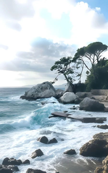 蓝天白云下海浪拍击岩岸清新海边风光