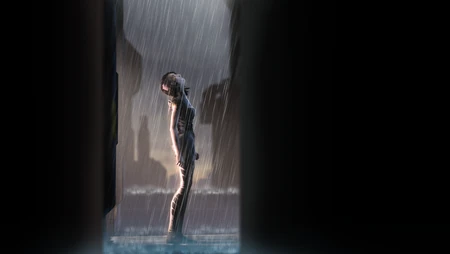 雨幕间隙中孤身伫立街头的淋雨少女侧影