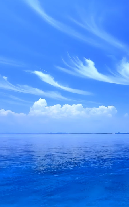 澄澈碧海蓝天 飘曳白云清新海景壁纸