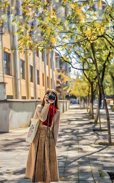 秋日街头持相机的文艺女生人像